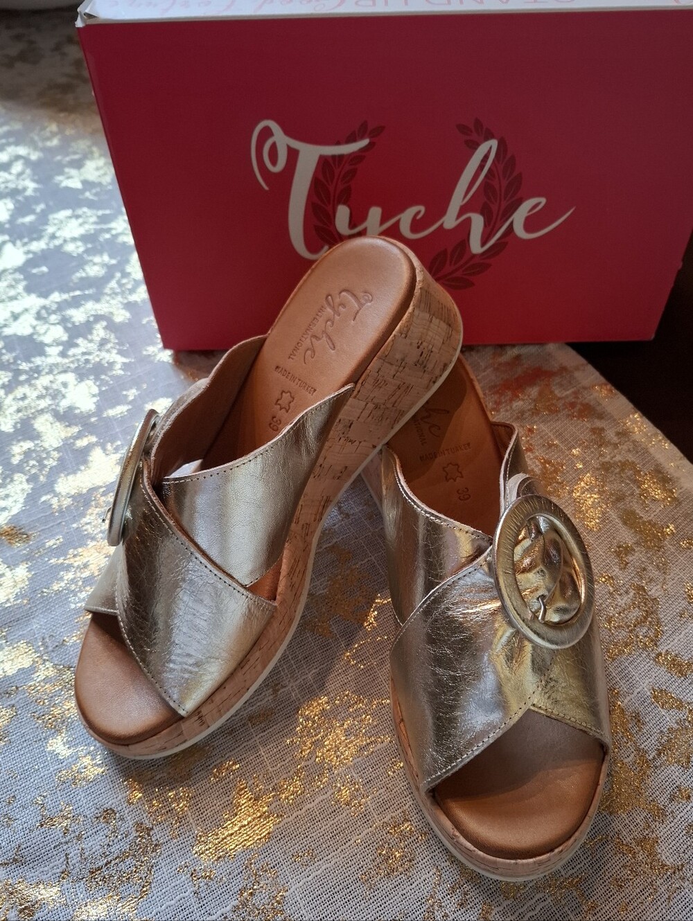 Tyche Metallic Gold Wedge Slide Sandal